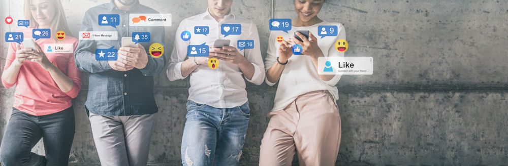 group of people looking at social media